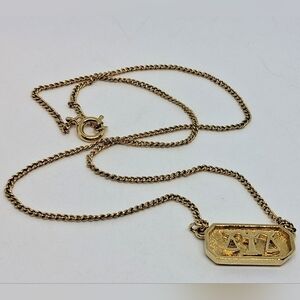 * Vintage Crown Trifari Gold Tone Libra Zodiac Necklace